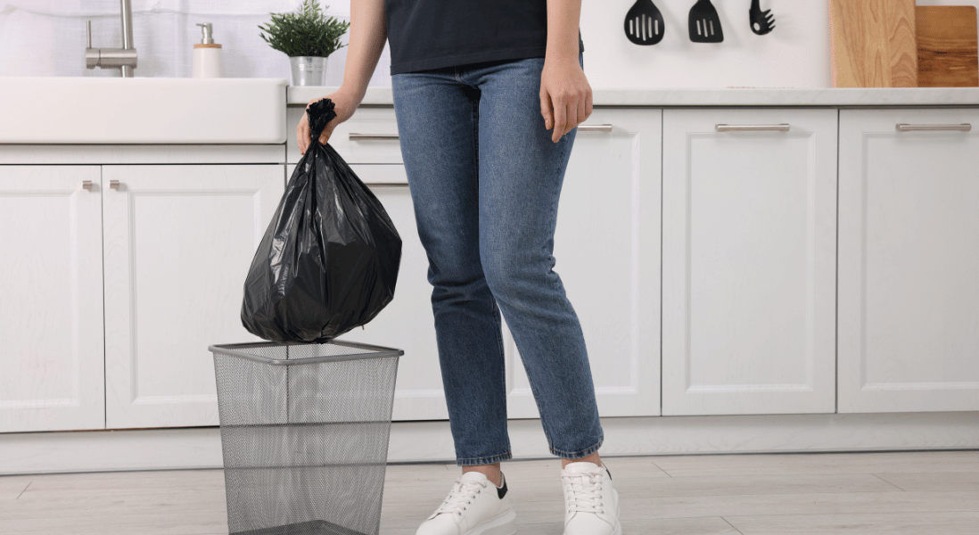 lady taking out trash best practice on pest control tips