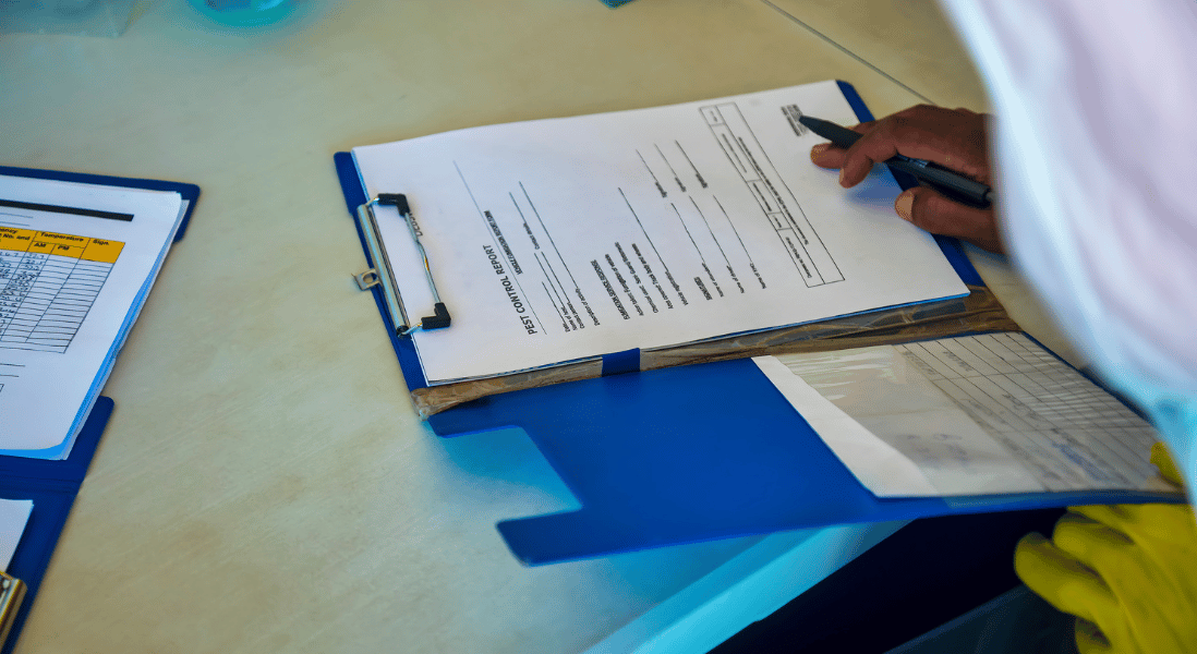 hands , pen , documents , glove